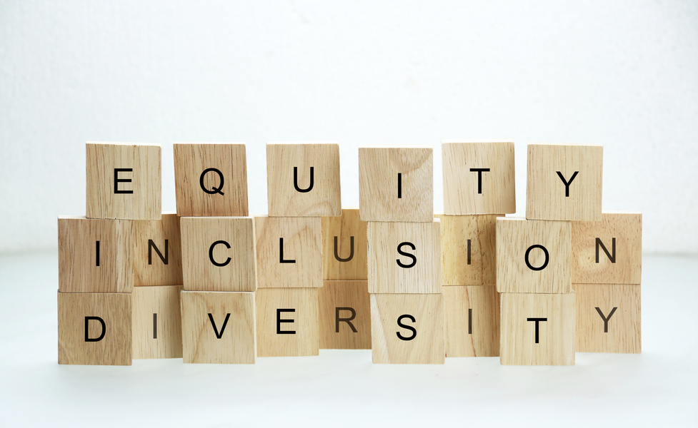 Diversity, equity, inclusion words on wooden blocks background DEI concept